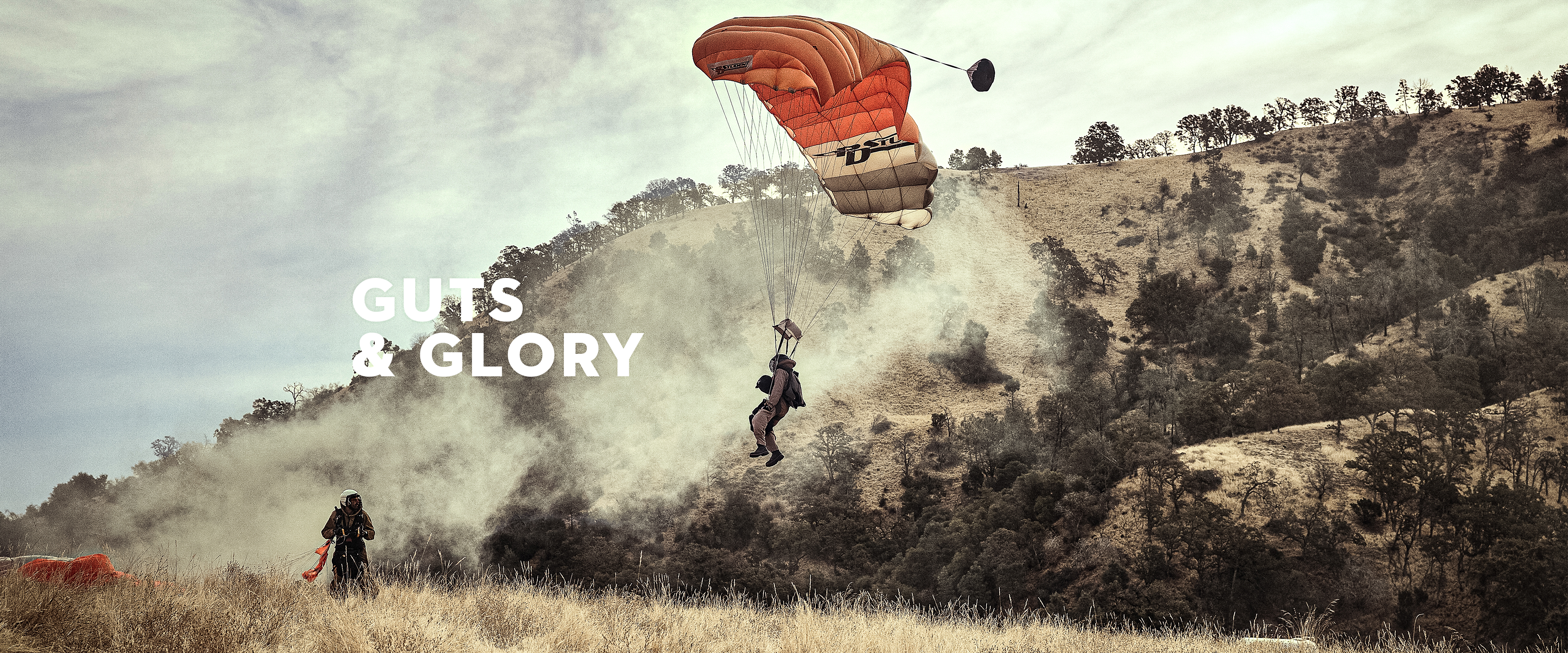 Smokejumpers landing in dry field